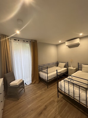 4 dormitorios, escritorio, tabla de planchar con plancha y wifi gratis