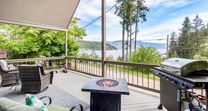 Beautiful 3-story home with lake/bay views, deck, grill, firepit & fireplace