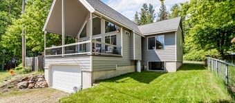 Beautiful 3-story home with lake/bay views, deck, grill, firepit & fireplace