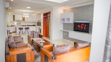 Executive Apartment, 2 Bedrooms | Living area | 42-inch LED TV with satellite channels, TV
