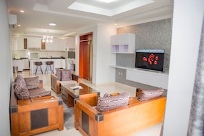 Executive Apartment, 2 Bedrooms | Living area | 42-inch LED TV with satellite channels, TV