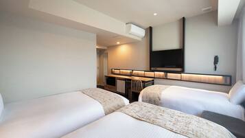 Chambre Triple Confort, non-fumeurs | Couette en duvet d'oie, bureau