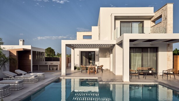 A modern house with a swimming pool, outdoor seating, and a pergola. - Anthis Luxury Villas - 3 Bedroom Villas with Private Pool (Zakynthos)