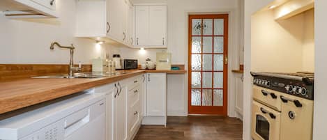 Fridge, dishwasher, toaster, cookware/dishes/utensils