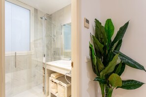 Shower, hair dryer, bidet, shampoo