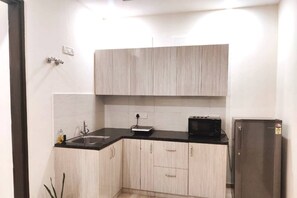 Fridge, oven, toaster, rice cooker - BluO Studio DLFGolfCourseRoadBalconyLift (Gurugram)