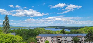 Enjoy breathtaking views of the lake and distant mountains from this serene residential area.