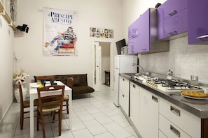 Fridge, microwave, electric kettle, cookware/dishes/utensils