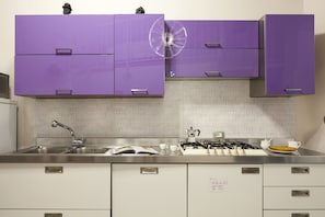 Fridge, microwave, electric kettle, cookware/dishes/utensils