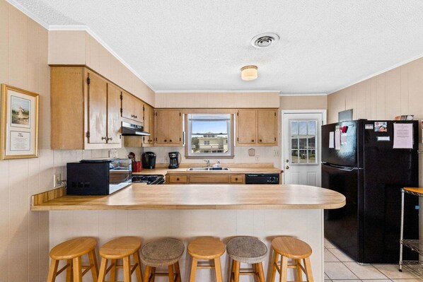 Fridge, microwave, oven, stovetop - Four Hours and Twenty Minutes / 1121 E Beach Drive (Oak Island)
