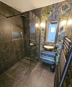 Shower, hair dryer, towels, soap