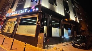 A multi-story building with a Zara Suit store on the ground floor. - Zara Suit (Istanbul)