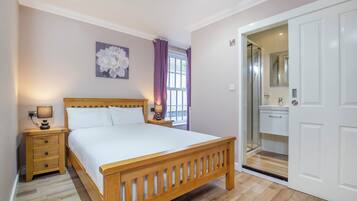 Deluxe Double Room | Desk, blackout drapes, iron/ironing board, free WiFi