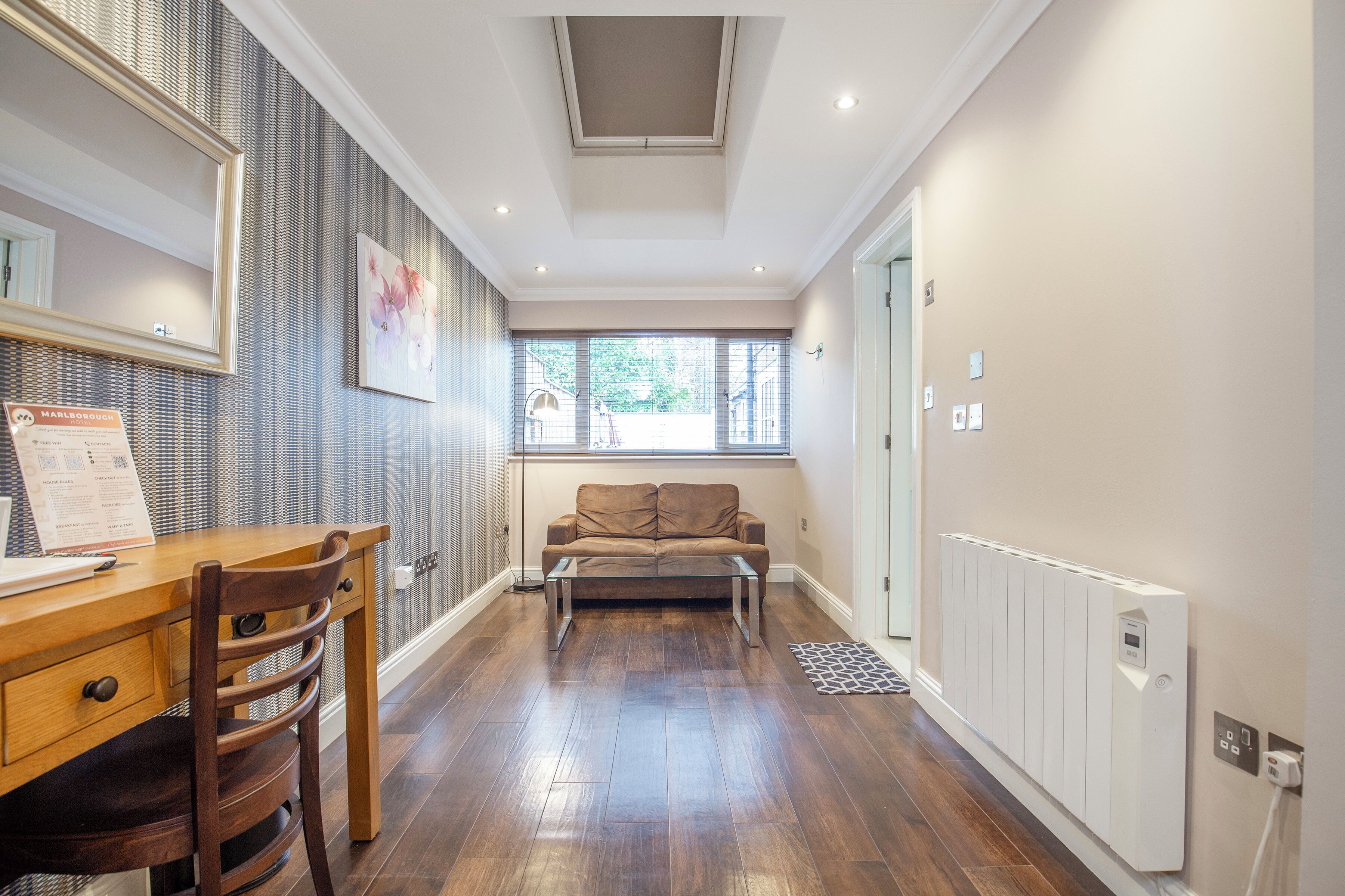 Deluxe Double Room | Desk, blackout drapes, iron/ironing board, free WiFi