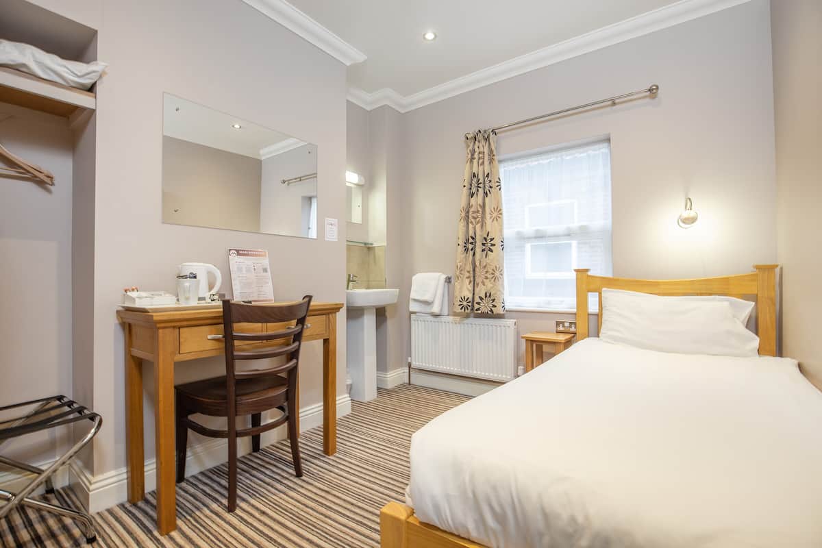 Single with Shared Bathroom | Desk, blackout drapes, iron/ironing board, free WiFi