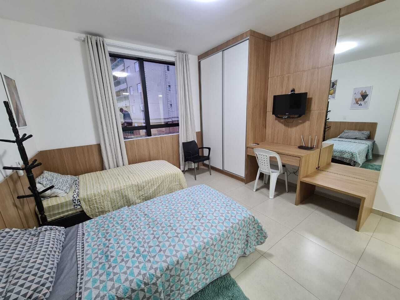 Premium bedding, desk, laptop workspace, free WiFi