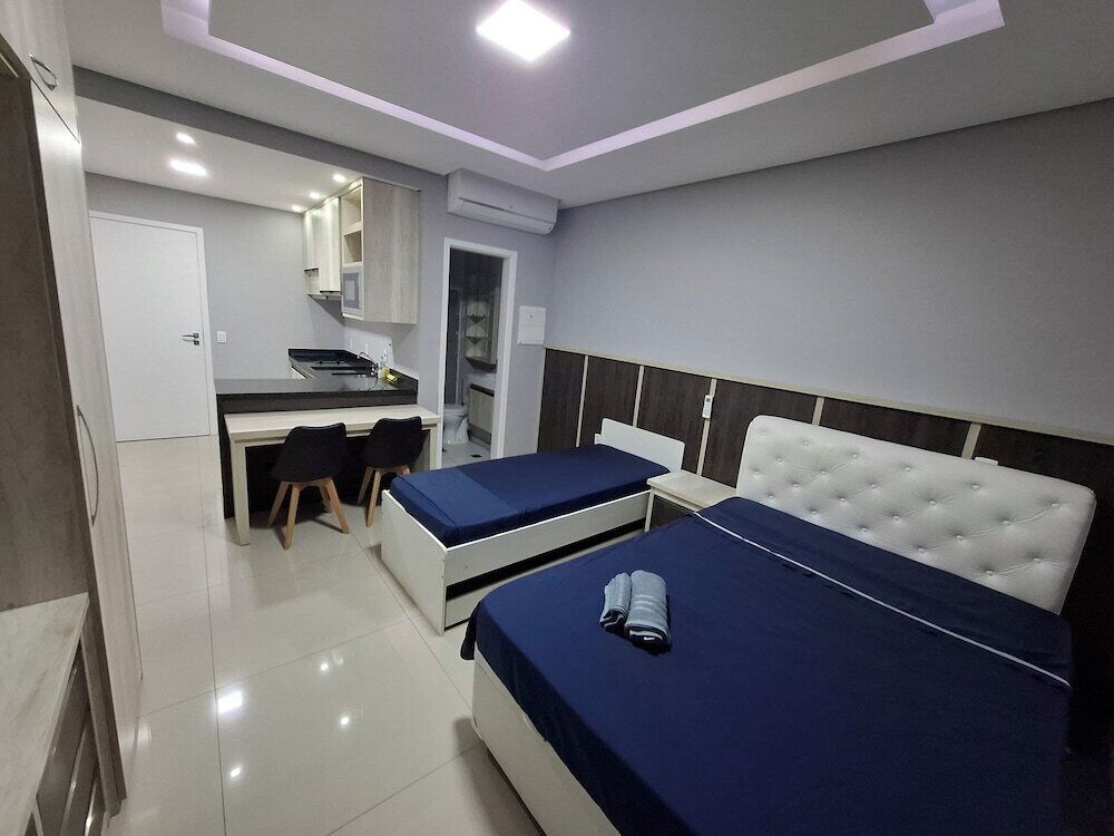 Premium bedding, desk, laptop workspace, free WiFi