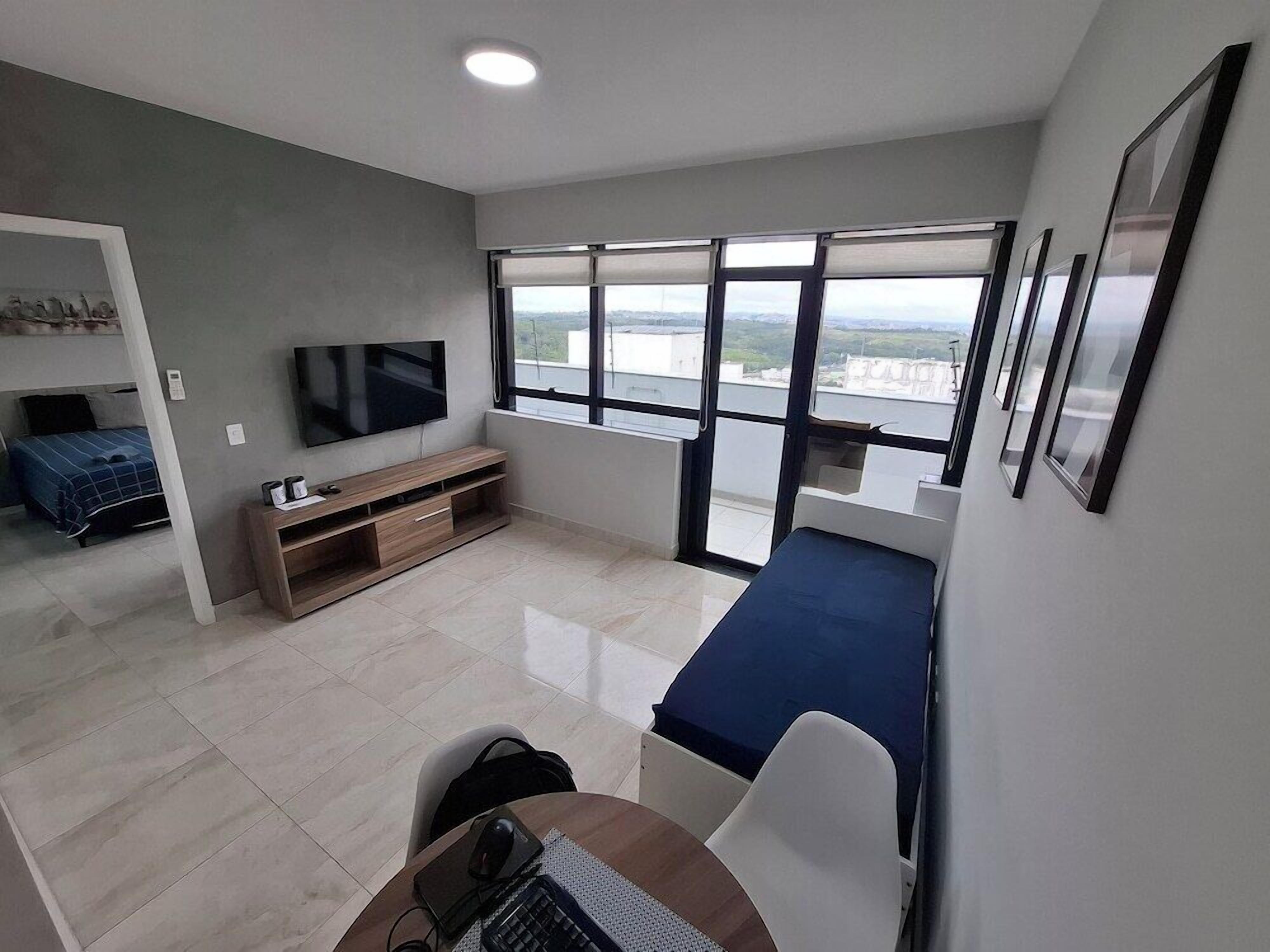 Premium bedding, desk, laptop workspace, free WiFi