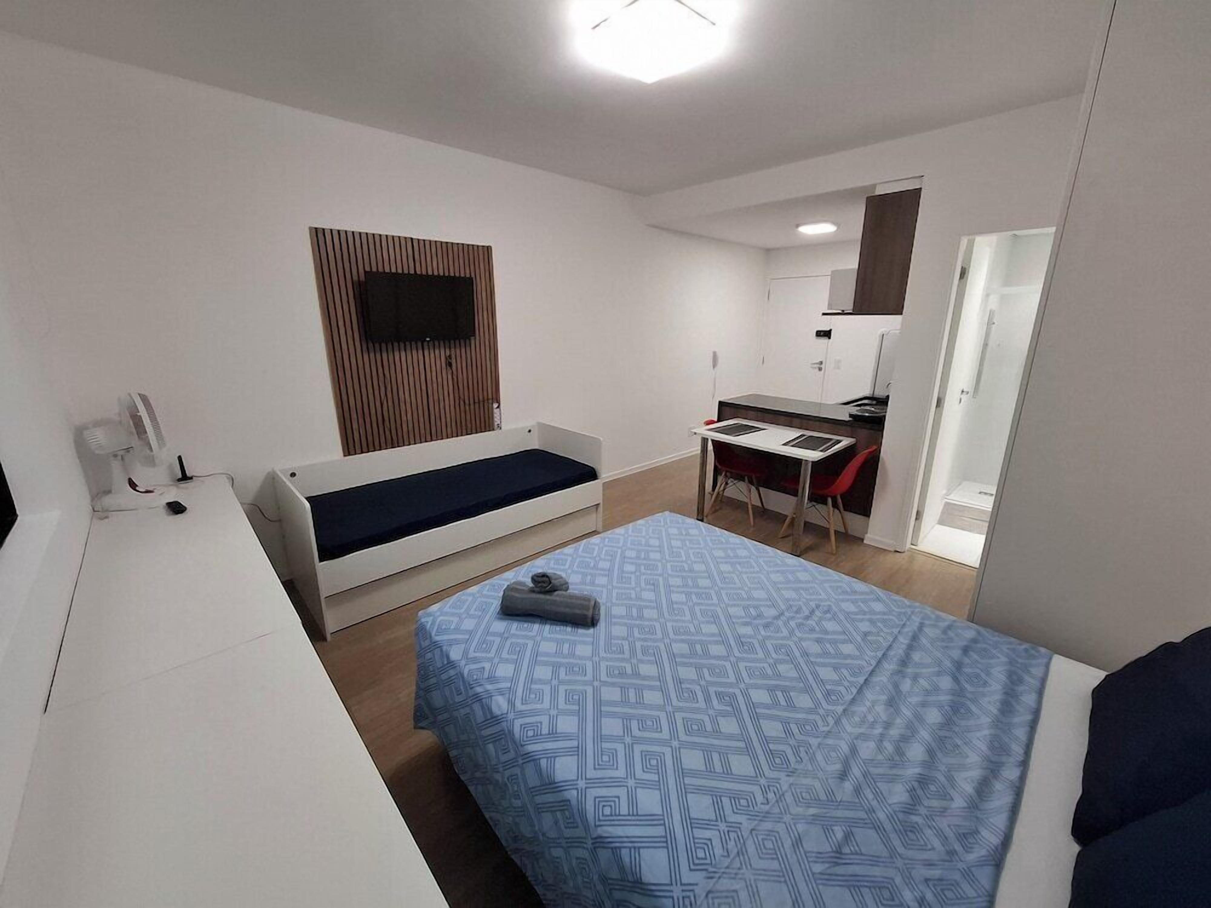 Premium bedding, desk, laptop workspace, free WiFi