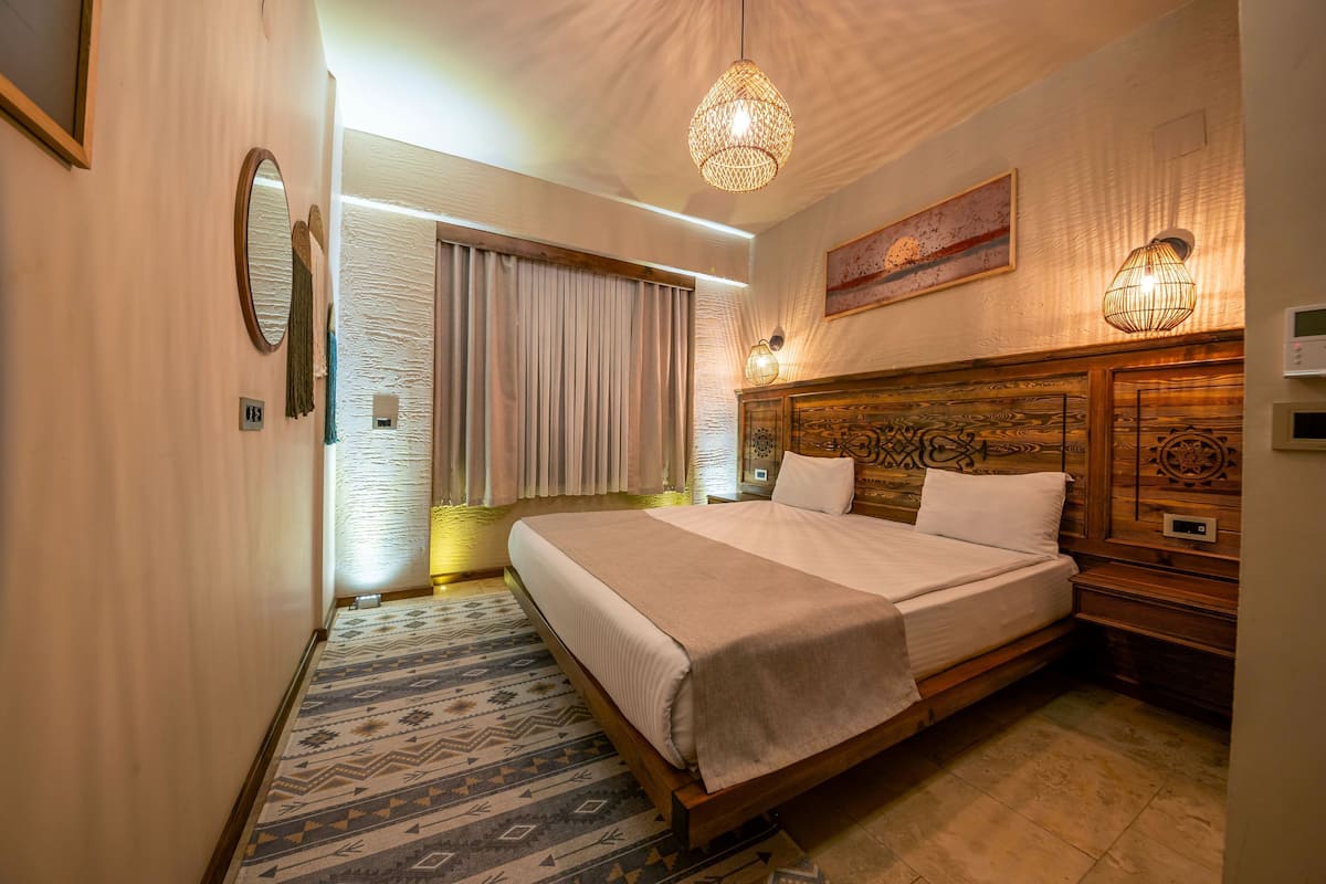 Elite Suite | Frette Italian sheets, premium bedding, down comforters