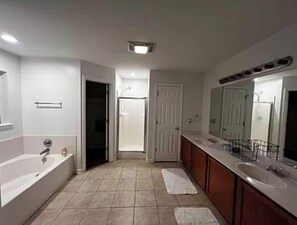 Shower, towels, toilet paper