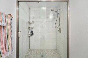 Bathtub, hair dryer, towels, soap