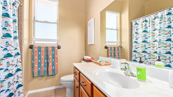 Combined shower/tub, towels, soap, toilet paper
