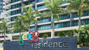 A multi-story building with a sign reading "Google Residence."