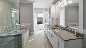 Combined shower/tub, jetted tub