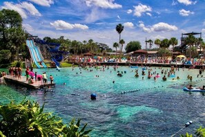 A water park with multiple slides and a large swimming area. - River Beach Retreat: with Tiki Bar, Fire Pit, Hot Tub & Clear Kayak (Spring Hill)