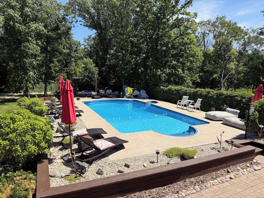 Seasonal outdoor pool, pool umbrellas, pool loungers