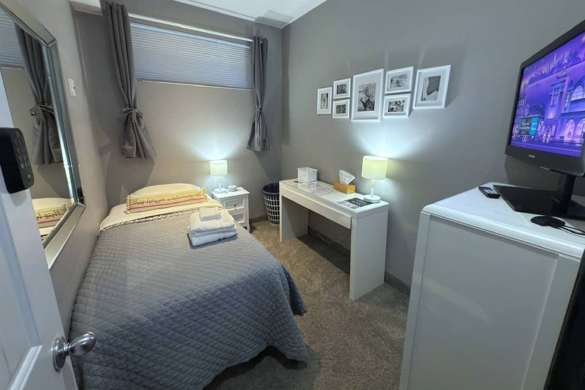 Economy Single Room (Breakfast and Limited Amenities Included) | Premium bedding, pillow-top beds, iron/ironing board, free WiFi