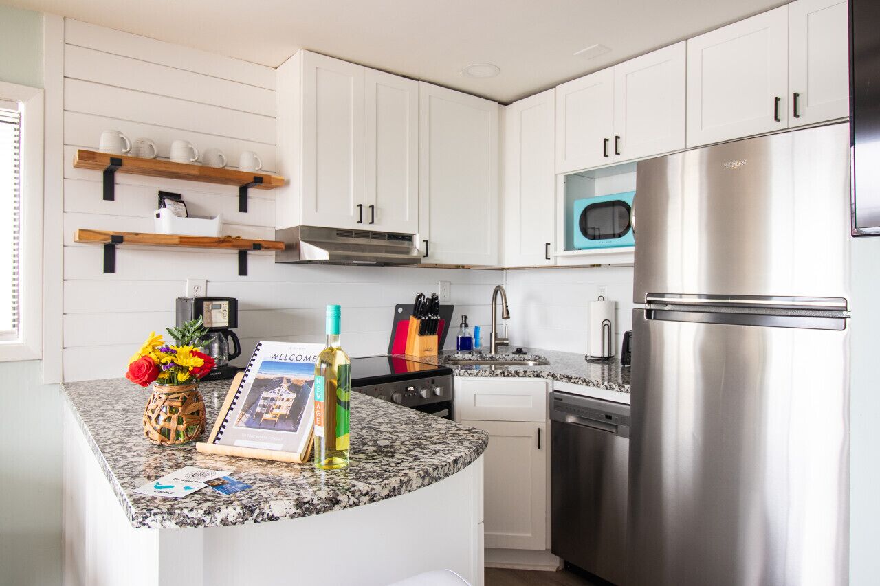 Frigorifero, microonde, forno, piano cottura