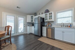 Fridge, coffee/tea maker, cookware/dishes/utensils