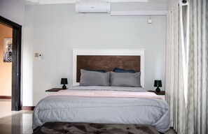 2 dormitorios, tabla de planchar con plancha, wifi gratis y ropa de cama