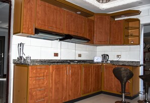 Fridge, microwave, oven, stovetop - Luxurious Two Bedroom Double Storey Apartments (Lusaka)