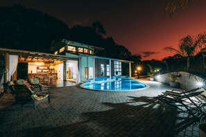 Outdoor pool, pool umbrellas, sun loungers