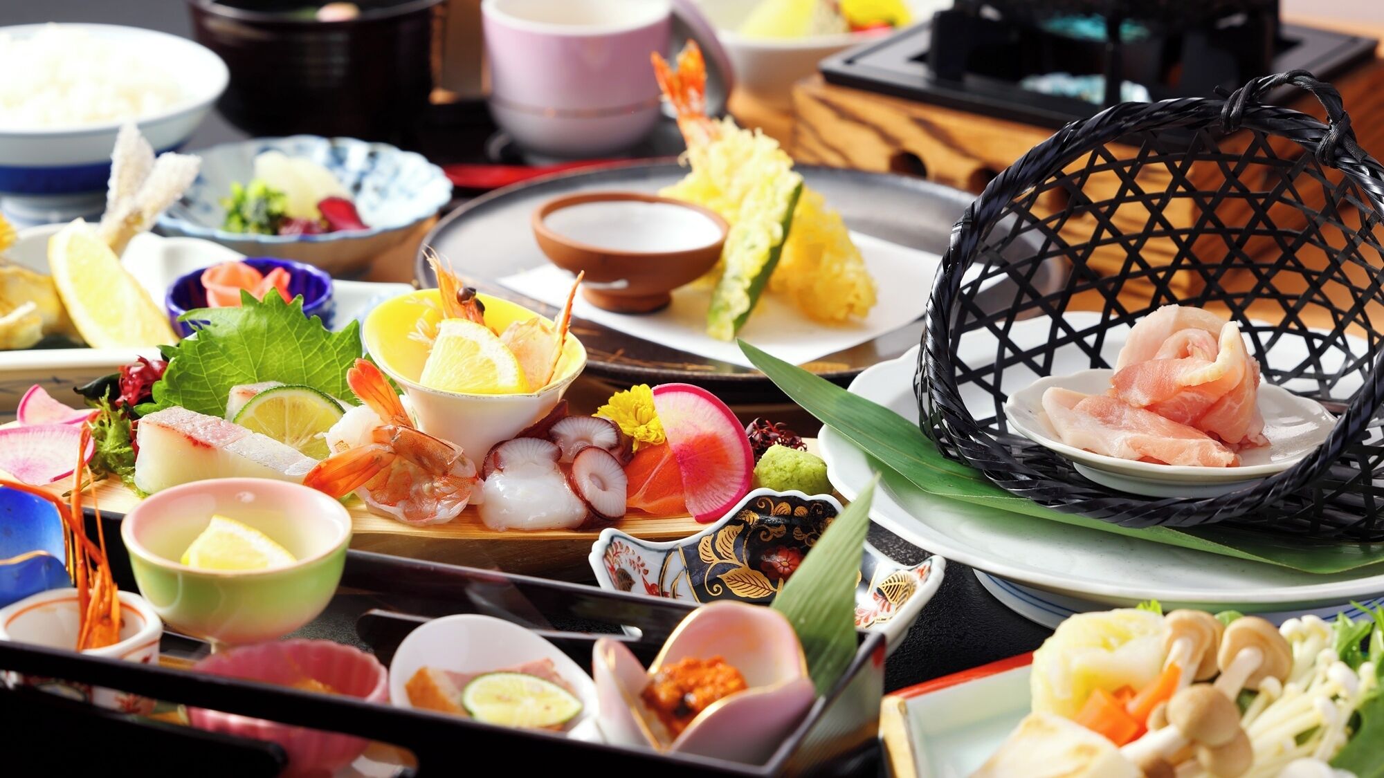 A variety of seafood dishes and condiments on a tray.