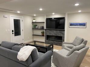 Smart TV, fireplace, books