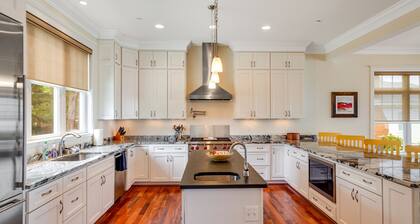 Spacious beachfront home with decks, gas grill, wet bar, gas fireplace, and W/D