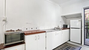 Fridge, microwave, toaster, cookware/dishes/utensils