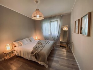 1 habitación, tabla de planchar con plancha, wifi y ropa de cama 