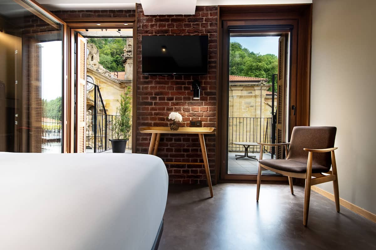 Premium Room, Terrace, City View | Minibar, in-room safe, desk, laptop workspace