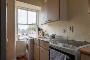 Apartamento básico, 2 camas de casal | Cozinha privada | Geladeira, micro-ondas, fogão, cooktop