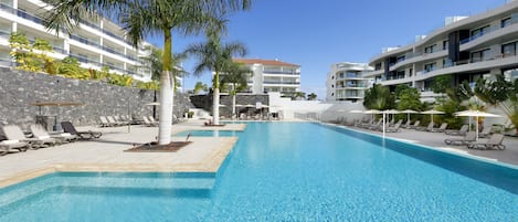2 outdoor pools, open 9:00 AM to 8:00 PM, pool umbrellas, sun loungers
