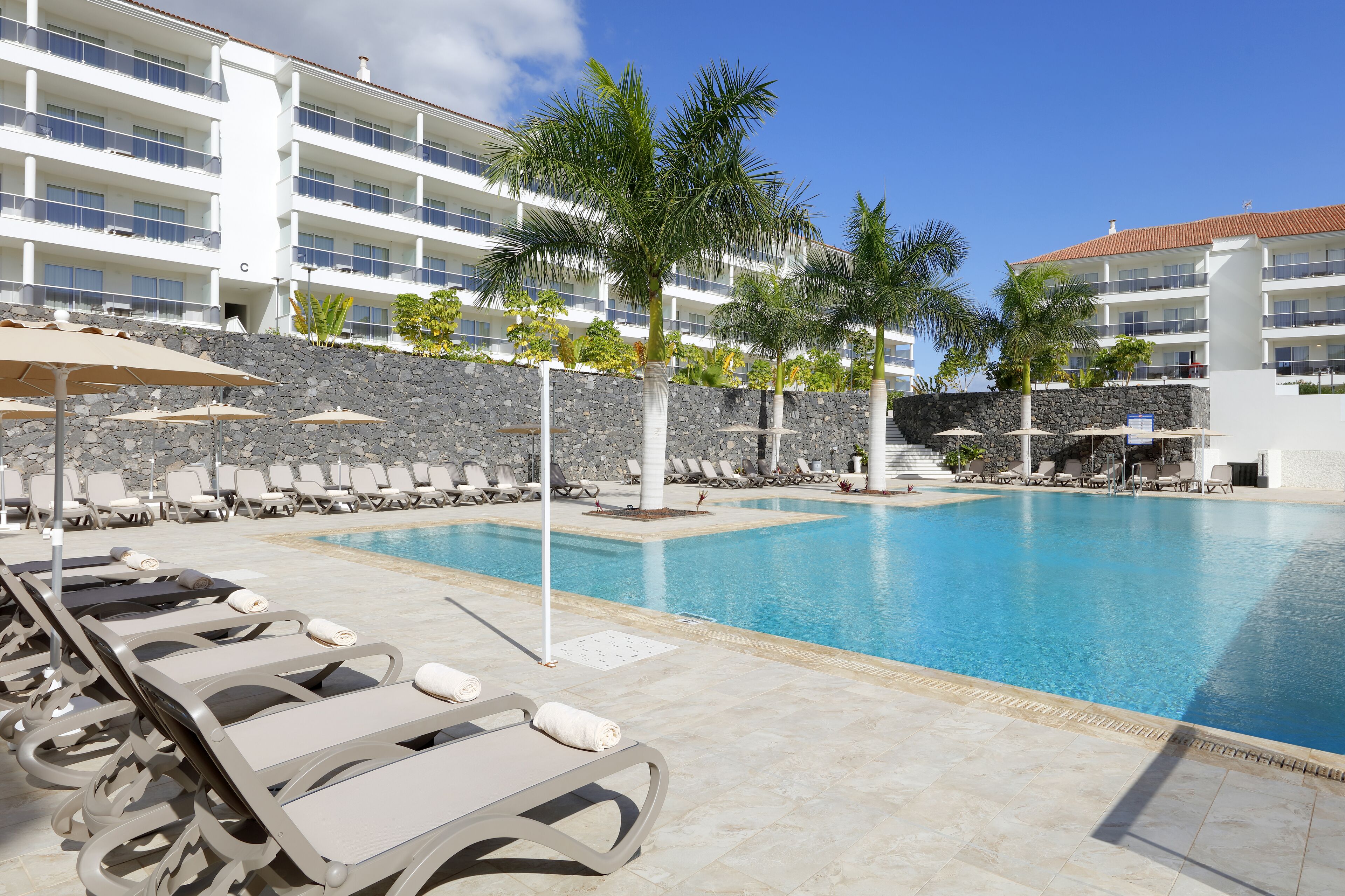 2 outdoor pools, open 9:00 AM to 8:00 PM, pool umbrellas, sun loungers