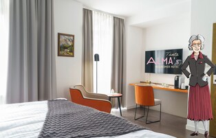 Basic Double Room | Living area | 45-inch flat-screen TV with cable channels