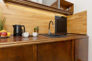 Fridge, microwave, stovetop, cookware/dishes/utensils