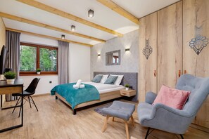 1 slaapkamer, een strijkplank/strijkijzer, wifi, beddengoed