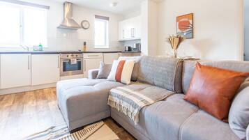 Deluxe Apartment, Non Smoking, Kitchen | Living area | 40-inch Smart TV with satellite channels, TV